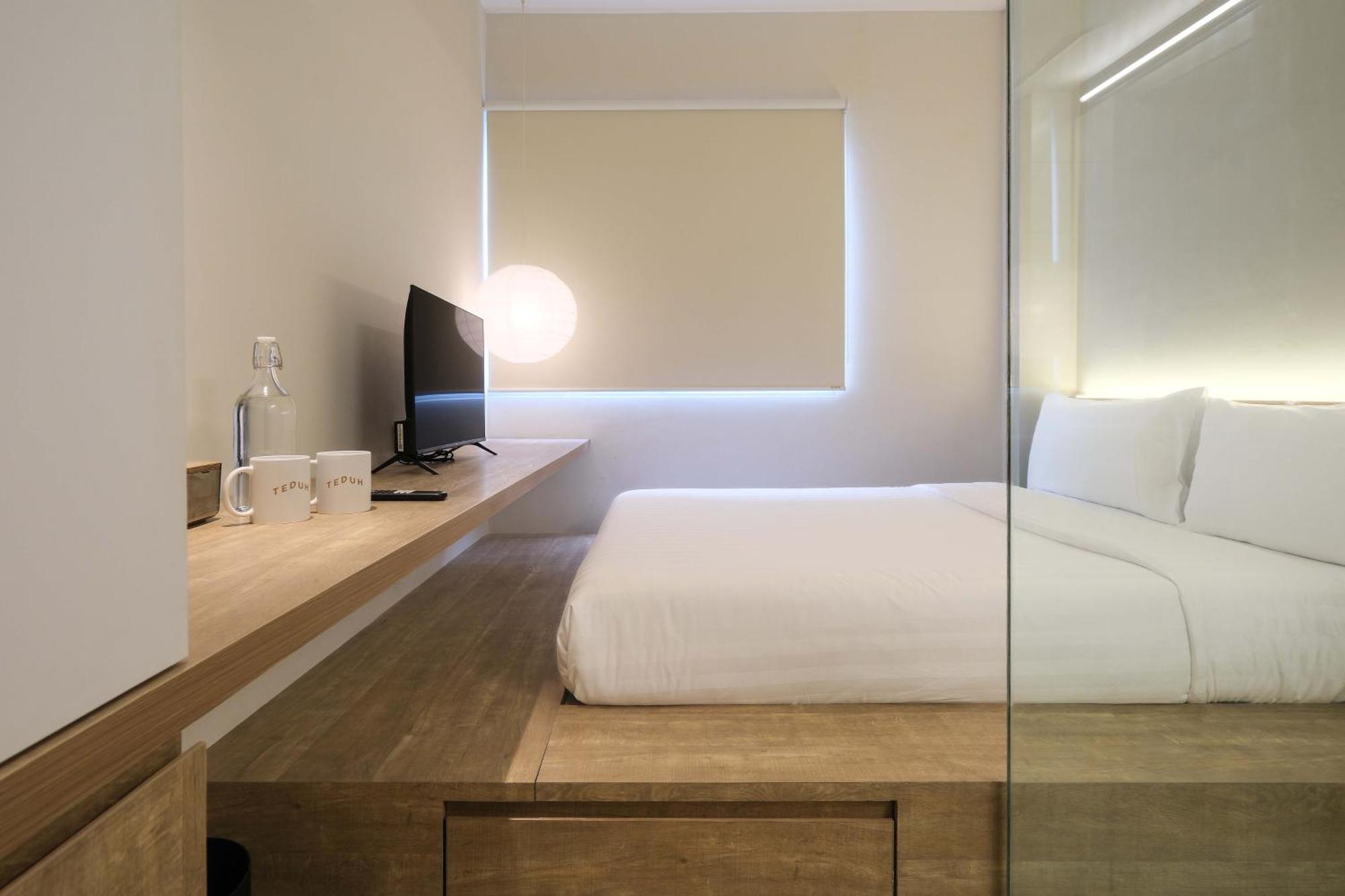 Teduh Simatupang Hotel Jakarta Szoba fotó